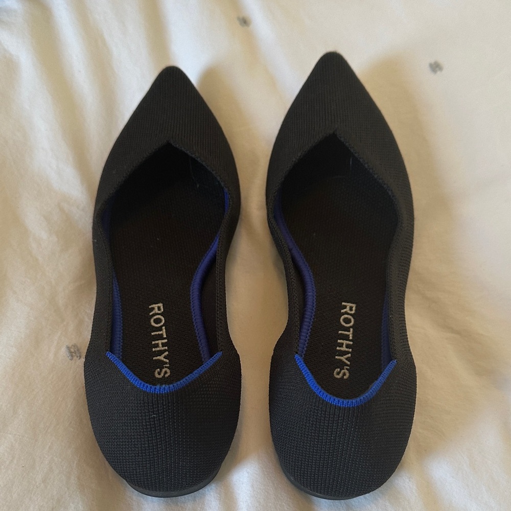 Rothy's Elegant Black Flats with Vibrant Blue Accent - Picture 4 of 6